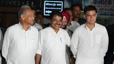 Congress leader K.C. Venugopal with Ashok Gehlot and Sachin Pilot after a meeting at party President Mallikarjun Kharge's residence, in New Delhi. (PTI) Congress leader K.C. Venugopal with Ashok Gehlot and Sachin Pilot after a meeting at party President Mallikarjun Kharge's residence, in New Delhi. (PTI)
