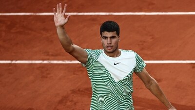 Spain's Carlos Alcaraz Garfia celebrates after winning against Italy's Flavio Cobolli at the end of their men's singles match on day two of the Roland-Garros Open (AFP) Spain's Carlos Alcaraz Garfia celebrates after winning against Italy's Flavio Cobolli at the end of their men's singles match on day two of the Roland-Garros Open (AFP)