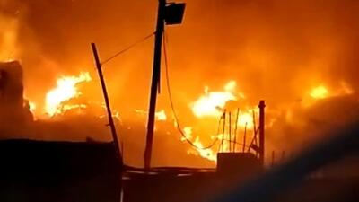 The fire brigade received a fire call at around 1:05 am on Monday after which a team of firemen along with nine fire tenders rushed to the spot. (HT PHOTO)