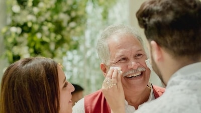 Parineeti Chopra wiping her father's tears during her engagement. Parineeti Chopra wiping her father's tears during her engagement.
