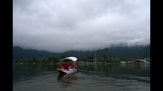 Several parts of northern Kashmir received rainfall and hailstorm on Monday. May had witnessed back-to-back western disturbances and hailstorms that caused damage to fruit and apple orchards. (HT File Photo)