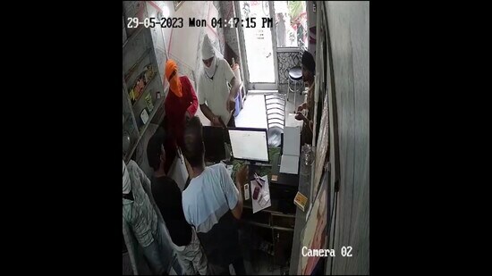 The robbery was recorded in the closed circuit television (CCTV) installed inside the cafe. (Video grab)
