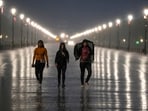 People walk on a road amid rains, in New Delhi, Tuesday, May 30, 2023. People walk on a road amid rains, in New Delhi, Tuesday, May 30, 2023.