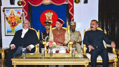 Himachal Pradesh governor Shiv Pratap Shukla (centre) flanked by newly sworn-in high court chief justice MS Ramachandra Rao (left) and chief minister Sukhvinder Singh Sukhu at the ceremony in Shimla on Tuesday. (PTI Photo) Himachal Pradesh governor Shiv Pratap Shukla (centre) flanked by newly sworn-in high court chief justice MS Ramachandra Rao (left) and chief minister Sukhvinder Singh Sukhu at the ceremony in Shimla on Tuesday. (PTI Photo)