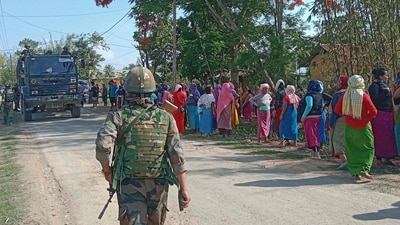 Indian Army soldiers patrol along the violence-hit area of Dolaithabi village in Manipur on Monday. (AFP) Indian Army soldiers patrol along the violence-hit area of Dolaithabi village in Manipur on Monday. (AFP)