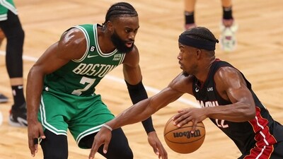 Jaylen Brown #7 of the Boston Celtics defends Jimmy Butler #22 of the Miami Heat during the fourth quarter in game seven of the Eastern Conference Finals at TD Garden on May 29, 2023 in Boston, Massachusetts. (Getty Images via AFP) Jaylen Brown #7 of the Boston Celtics defends Jimmy Butler #22 of the Miami Heat during the fourth quarter in game seven of the Eastern Conference Finals at TD Garden on May 29, 2023 in Boston, Massachusetts. (Getty Images via AFP)