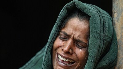 A family member of Deepu, a worker who was shot dead by Lashkar-e-Taiba terrorists in Anantnag district on Monday, mourns his demise, in Udhampur district. (PTI) A family member of Deepu, a worker who was shot dead by Lashkar-e-Taiba terrorists in Anantnag district on Monday, mourns his demise, in Udhampur district. (PTI)
