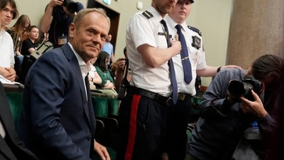Poland's opposition leader and former prime minister, Donald Tusk, watches lawmakers vote to approve a contentious draft law in parliament in Warsaw, Poland, on Friday, May 26, 2023. The law is for investigating Russia's alleged influence in Poland that is targeting the opposition, especially Tusk, and may affect the outcome of fall parliamentary elections. (AP Photo/Czarek Sokolowski) (AP) Poland's opposition leader and former prime minister, Donald Tusk, watches lawmakers vote to approve a contentious draft law in parliament in Warsaw, Poland, on Friday, May 26, 2023. The law is for investigating Russia's alleged influence in Poland that is targeting the opposition, especially Tusk, and may affect the outcome of fall parliamentary elections. (AP Photo/Czarek Sokolowski) (AP)