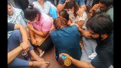 Protesting wrestlers at Har ki Pauri, in Haridwar, on Tuesday. (PTI) Protesting wrestlers at Har ki Pauri, in Haridwar, on Tuesday. (PTI)