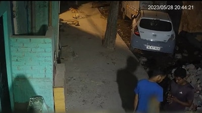 In the new footage, Sahil is seen chatting with another youth for a few seconds right next to the spot where he allegedly killed the girl seconds later. (ANI) In the new footage, Sahil is seen chatting with another youth for a few seconds right next to the spot where he allegedly killed the girl seconds later. (ANI)