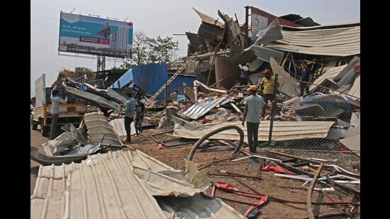 According to the anti-encroachment department, an average of 20-22 officers are available on duty on a regular basis, making the anti-encroachment effort a major task for the civic authorities. (HT FILE PHOTO)