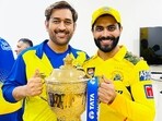 Chennai Super Kings skipper MS Dhoni and Ravindra Jadeja pose for a picture with the IPL trophy