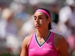 France's Caroline Garcia reacts after missing a shot against Russia's Anna Blinkova France's Caroline Garcia reacts after missing a shot against Russia's Anna Blinkova