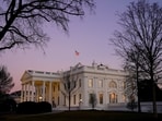 FILE PHOTO: The White House is seen at sunset on U.S. President Joe Biden's first day in office in Washington, U.S., January 20, 2021. REUTERS/Erin Scott/File Photo