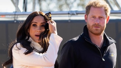 FILE - Prince Harry and Meghan Markle, Duke and Duchess of Sussex visit the track and field event at the Invictus Games in The Hague, Netherlands, Sunday, April 17, 2022. A spokesperson for Prince Harry and his wife Meghan says the couple were involved in a car chase while being followed by photographers. The couple’s office says the pair and Meghan’s mother were followed for more than two hours by a half-dozen vehicles after leaving a charity event in New York on Tuesday, May 16, 2023. (AP) FILE - Prince Harry and Meghan Markle, Duke and Duchess of Sussex visit the track and field event at the Invictus Games in The Hague, Netherlands, Sunday, April 17, 2022. A spokesperson for Prince Harry and his wife Meghan says the couple were involved in a car chase while being followed by photographers. The couple’s office says the pair and Meghan’s mother were followed for more than two hours by a half-dozen vehicles after leaving a charity event in New York on Tuesday, May 16, 2023. (AP)