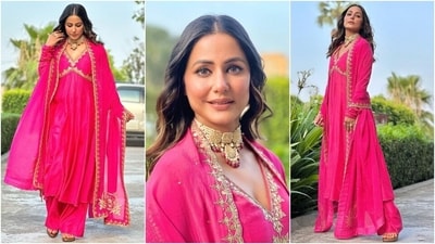 While the rani pink-coloured anarkali kurti features a plunging neckline, full-length churidaar sleeves, golden thread embroidery, sequin embellishments, flowy silhouette, and a cinched detail under the bust, the matching palazzo pants have a flared silhouette. She completed the outfit with a matching gold thread-embroidered dupatta. (Instagram) While the rani pink-coloured anarkali kurti features a plunging neckline, full-length churidaar sleeves, golden thread embroidery, sequin embellishments, flowy silhouette, and a cinched detail under the bust, the matching palazzo pants have a flared silhouette. She completed the outfit with a matching gold thread-embroidered dupatta. (Instagram)