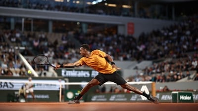 Gael Monfils plays a backhand return to Sebastian Baez (AFP) Gael Monfils plays a backhand return to Sebastian Baez (AFP)