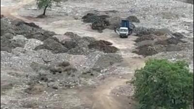 Trucks dumping debris at Corporate Park in Kharghar on Tuesday (HT PHOTO) Trucks dumping debris at Corporate Park in Kharghar on Tuesday (HT PHOTO)