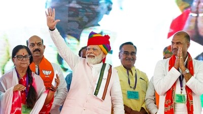 Prime Minister Narendra Modi waves at supporters during a public meeting in Ajmer, Wednesday, May 31, 2023. (PTI) Prime Minister Narendra Modi waves at supporters during a public meeting in Ajmer, Wednesday, May 31, 2023. (PTI)