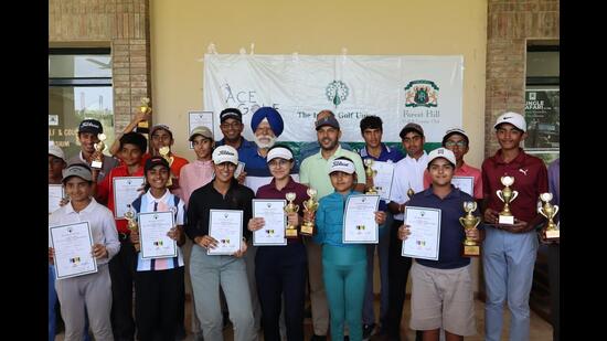 Winners showcasing their certificates and trophies won in Indian Golf Union North zone junior and sub-junior Feeder tour which concluded at the Forest Hill Golf and Country Club on Tuesday. (HT Photo)