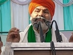 Bharatiya Kisan Union (BKU) leader Rakesh Tikait addresses a Khap 'Mahapanchayat' organised over the ongoing protest by wrestlers against WFI President Brij Bhushan Sharan Singh, at Soram village, in Muzaffarnagar, 