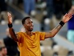 France's Gael Monfils celebrates winning his first round match against Argentina's Sebastian Baez