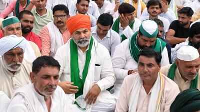 BKU national spokesperson Rakesh Tikait with farmers attending a ‘mahapanchayat’ in Muzaffarnagar on Thursday. (Ishant) BKU national spokesperson Rakesh Tikait with farmers attending a ‘mahapanchayat’ in Muzaffarnagar on Thursday. (Ishant)