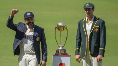 India's captain Rohit Sharma and Australia's captain Pat Cummins pose with the Border–Gavaskar Trophy (AP) India's captain Rohit Sharma and Australia's captain Pat Cummins pose with the Border–Gavaskar Trophy (AP)