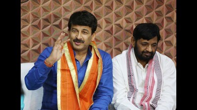 JP leder Manoj Tiwari and union minister Kaushal Kishor at the press conference. (HT) JP leder Manoj Tiwari and union minister Kaushal Kishor at the press conference. (HT)