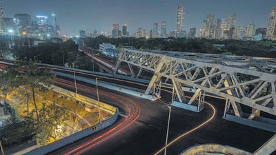 Mumbai, India - June 01, 2023: One arm of Delisle Bridge opened for traffic after five years. The bridge which serves as a major link connecting Lower Parel, Worli and Prabhadevi, in the West, with Currey Road, Lalbaug and Byculla, in the East, was shut down in 2018, after IIT-Bombay, which studied the structure in the wake of the Gokhale Bridge collapse, said it was corroded, at Lower Parel, in Mumbai, India, on Thursday, June 01, 2023. (Photo by Satish Bate/ Hindustan Times) (Satish Bate/HT PHOTO) Mumbai, India - June 01, 2023: One arm of Delisle Bridge opened for traffic after five years. The bridge which serves as a major link connecting Lower Parel, Worli and Prabhadevi, in the West, with Currey Road, Lalbaug and Byculla, in the East, was shut down in 2018, after IIT-Bombay, which studied the structure in the wake of the Gokhale Bridge collapse, said it was corroded, at Lower Parel, in Mumbai, India, on Thursday, June 01, 2023. (Photo by Satish Bate/ Hindustan Times) (Satish Bate/HT PHOTO)