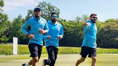 Virat Kohli (R) with bowlers Umesh Yadav (L) and Mohammed Siraj at a practice session ahead of the World Test Championship final cricket match between India and Australia in UK (PTI) Virat Kohli (R) with bowlers Umesh Yadav (L) and Mohammed Siraj at a practice session ahead of the World Test Championship final cricket match between India and Australia in UK (PTI)