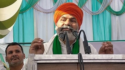 Bharatiya Kisan Union (BKU) leader Rakesh Tikait addresses a Khap 'Mahapanchayat' organised over the ongoing protest by wrestlers against WFI President Brij Bhushan Sharan Singh, at Soram village, in Muzaffarnagar, (PTI) Bharatiya Kisan Union (BKU) leader Rakesh Tikait addresses a Khap 'Mahapanchayat' organised over the ongoing protest by wrestlers against WFI President Brij Bhushan Sharan Singh, at Soram village, in Muzaffarnagar, (PTI)