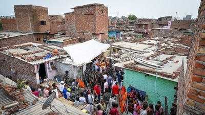 People gather outside the residence of the 16-year-old girl who was allegedly stabbed to death by a man on Sunday in Shahbad Dairy, on Thursday. (Sanchit Khanna/HT PHoto) People gather outside the residence of the 16-year-old girl who was allegedly stabbed to death by a man on Sunday in Shahbad Dairy, on Thursday. (Sanchit Khanna/HT PHoto)