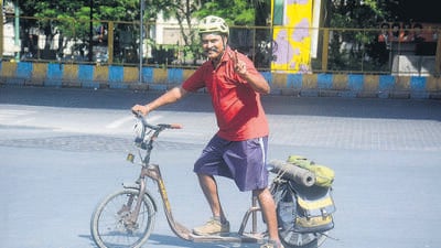 Thane, India - June, 01, 2023: Thane-based cyclist Rajesh Khandekar travelled from Kashmir to Kanyakumari on a foot-pushed bicycle with a message to save the environment, in Thane, India, on Thursday, June 01, 2023. (Praful Gangurde/HT Photo)