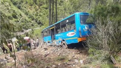 The Himachal Road Transport (HRTC) bus that skidded off the road and rolled down a 100m gorge at Kshol near Karsog in Mandi district on Thursday morning. (HT Photo)