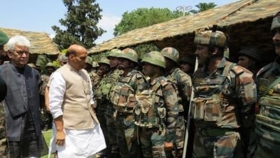 Defence Minister Rajnath Singh along with J&K Lt Gov Manoj Sinha in Rajouri a day after the May 5 attack.