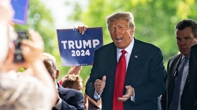 Former US President Donald Trump arrives to meet with local Republican leaders at the Machine Shed restaurant in Urbandale, Iowa, US, on Thursday. (Bloomberg)