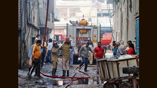 The fire broke out at the storage area of the Hinglaj Processors in Jagdish Pura and spread to the whole building. (Manish/HT Photo)