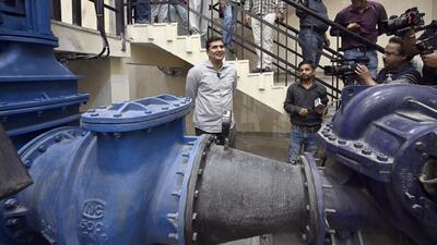 Delhi water minister Saurabh Bharadwaj at an underground reservoir (UGR) after complaints about contamination, in Mayur Vihar Phase-1, under the Patparganj assembly constituency, on Friday. (Sanjeev Verma/HT photo) Delhi water minister Saurabh Bharadwaj at an underground reservoir (UGR) after complaints about contamination, in Mayur Vihar Phase-1, under the Patparganj assembly constituency, on Friday. (Sanjeev Verma/HT photo)