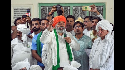 Farmer leader Rakesh Tikait speaks during a khap panchayat in Kurukshetra on Friday. (ANI) Farmer leader Rakesh Tikait speaks during a khap panchayat in Kurukshetra on Friday. (ANI)