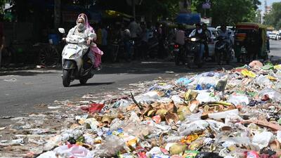 Gurugram, India-June 02, 2023: Garbage Piles seen spread over Khandsa road near Shivaji Nagar due to the ongoing protest by sanitation workers against the Municipal Corporation of Gurugram (MCG) in Gurugram, India, on Friday, 02 June 2023. (Photo by Parveen Kumar/Hindustan Times)**To go with Leena Dhankar's story