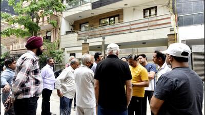 Locals outside the house in Krishna Nagar where the mother-daughter duo were found killed on Wednesday night, in New Delhi. (Sonu Mehta/HT) Locals outside the house in Krishna Nagar where the mother-daughter duo were found killed on Wednesday night, in New Delhi. (Sonu Mehta/HT)