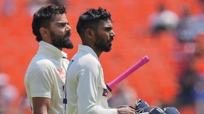 Virat Kohli (L) and Srikar Bharat (PTI) Virat Kohli (L) and Srikar Bharat (PTI)