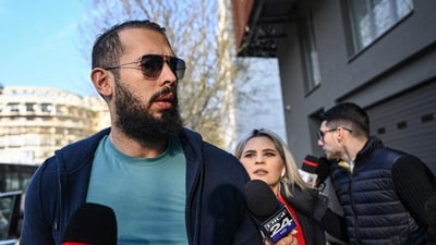 Controversial influencer Andrew Tate arrives at the Directorate for the Investigation of Organized Crime and Terrorism (DIICOT) to attend a hearing. (AFP) Controversial influencer Andrew Tate arrives at the Directorate for the Investigation of Organized Crime and Terrorism (DIICOT) to attend a hearing. (AFP)