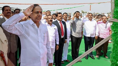 Telangana chief minister K Chandrashekhar Rao salutes after hoisting the national flag during the Telangana State Formation Day celebrations, at Raj Bhavan, in Hyderabad on Friday. (ANI Photo) Telangana chief minister K Chandrashekhar Rao salutes after hoisting the national flag during the Telangana State Formation Day celebrations, at Raj Bhavan, in Hyderabad on Friday. (ANI Photo)