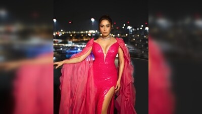 The official Instagram handle of Taneiya Khanuja featured Nushrratt Bharuccha in their custom-made gown. "Everyone else can go home 'cos @nushrrattbharuccha totally owned this Queen look. Slaying in our custom sequence gown at the IIFA Green Carpet," they captioned their post.&nbsp; (Instagram/@tanieyakhanuja)