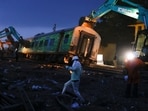 People work at the site of a train collision after the accident in Balasore district in the eastern state of Odisha, India, June 3, 2023. 