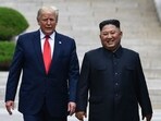 North Korean leader Kim Jong Un walks with former US President Trump north of the military demarcation line that divides North and South Korea, in the Joint Security Area of Panmunjom in the Demilitarized Zone. North Korean leader Kim Jong Un walks with former US President Trump north of the military demarcation line that divides North and South Korea, in the Joint Security Area of Panmunjom in the Demilitarized Zone.