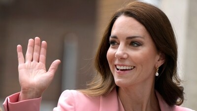Britain's Kate, The Princess of Wales, Patron of the Foundling Museum, waves as she arrives to visit the Museum in London, Thursday, May 25, 2023. The Princess will meet those with lived experience of the care system, as well as with foster carers and adoptive parents to hear about their experiences. (AP Photo/Alastair Grant) (AP)