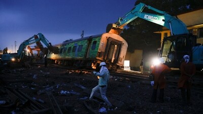 People work at the site of a train collision after the accident in Balasore district in the eastern state of Odisha, India, June 3, 2023. (Reuters)